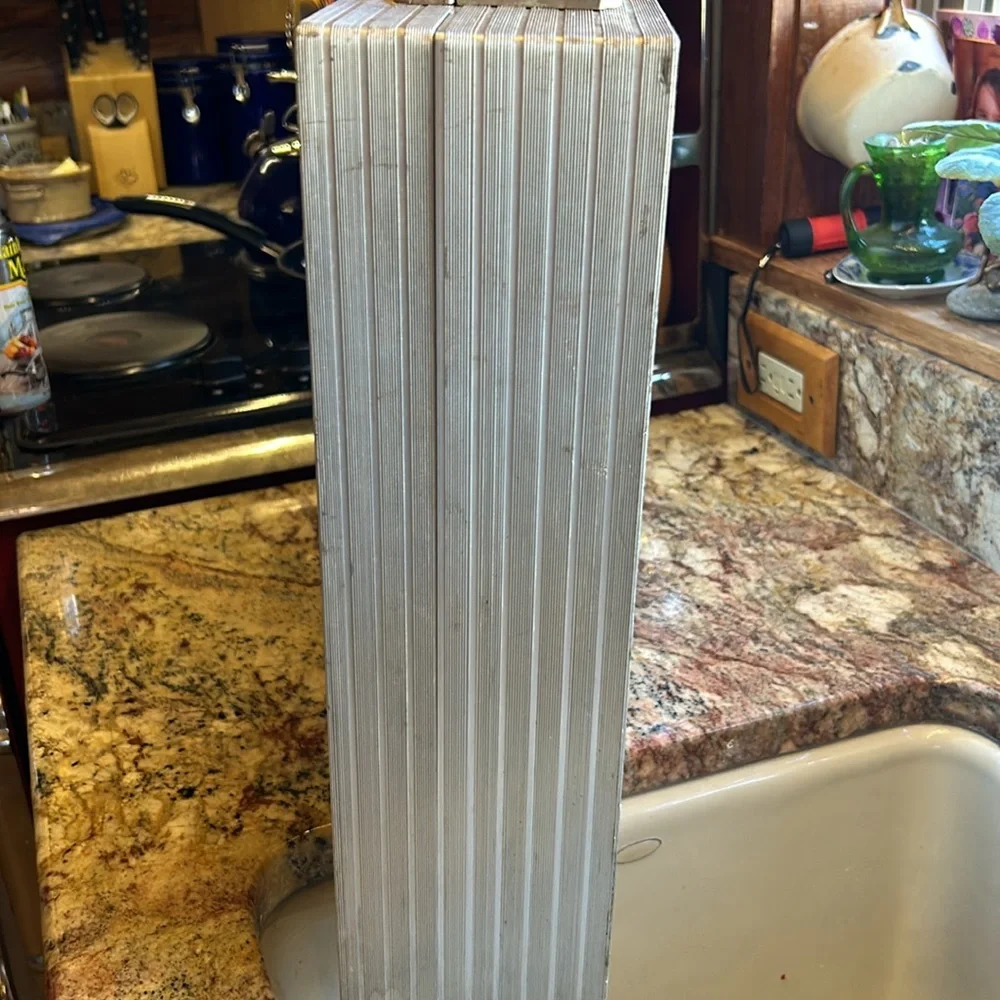 Aluminum padded case, handy for carrying anything; 24”long, 13.5”wide 4” deep